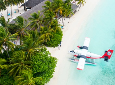 Seaplane landing on the beach